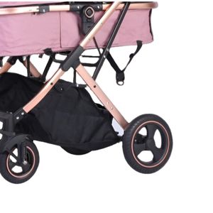 Coche moisés Barbara con bolsa pañalera, llantas de caucho, rosado