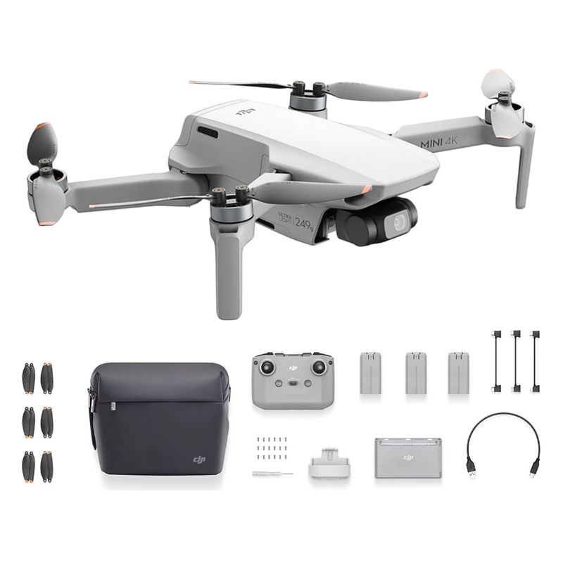 Drone DJI Mini 4K Fly More Combo gris con cámara de 12MP, grabación 4K y kit avanzado que incluye control remoto, tres baterías inteligentes, centro de carga y bolso de transporte vista frontal fondo blanco
