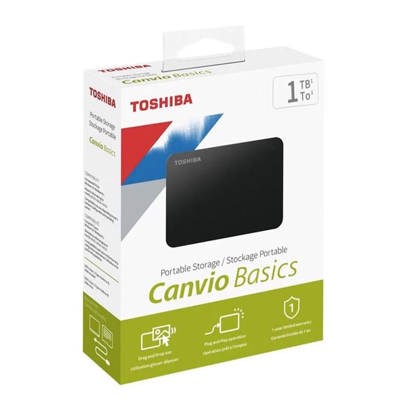 Disco duro externo Toshiba Canvio Basics de 1TB color negro presentado en su empaque original con detalles de capacidad y compatibilidad sobre fondo blanco