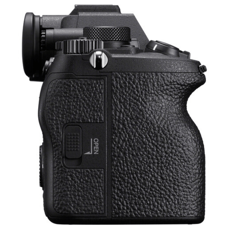 Cámara mirrorless Sony Alpha a7 IV 33MP video 4K cuerpo solo negro con kit deluxe completo y trípode vista lateral