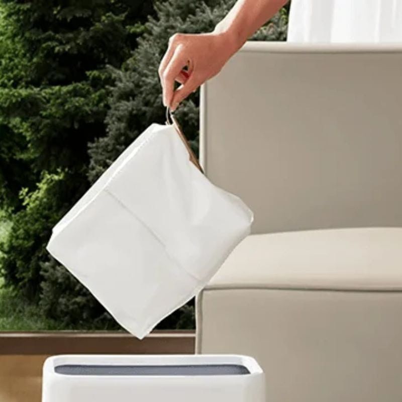 Robot aspirador Xiaomi H40 en uso limpieza hogar inteligente color blanco