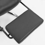 Silla gerencial Sillium reclinable con reposapiés negra reposapiés